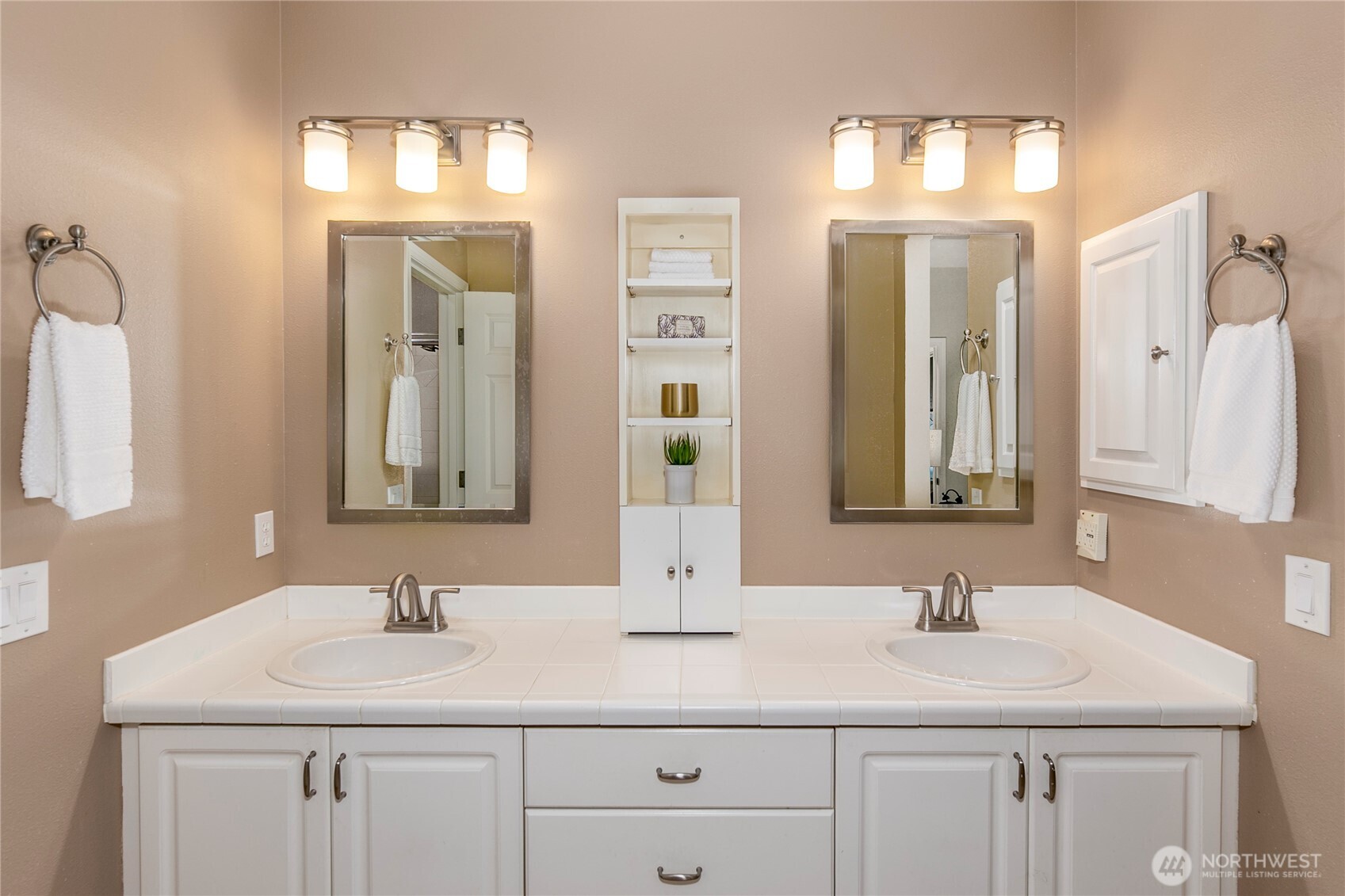 5500 Harbour Pointe Boulevard, Unit B202 Mukilteo, WA 98275 - Photo 17 of 30 a bathroom with double sink and a mirror