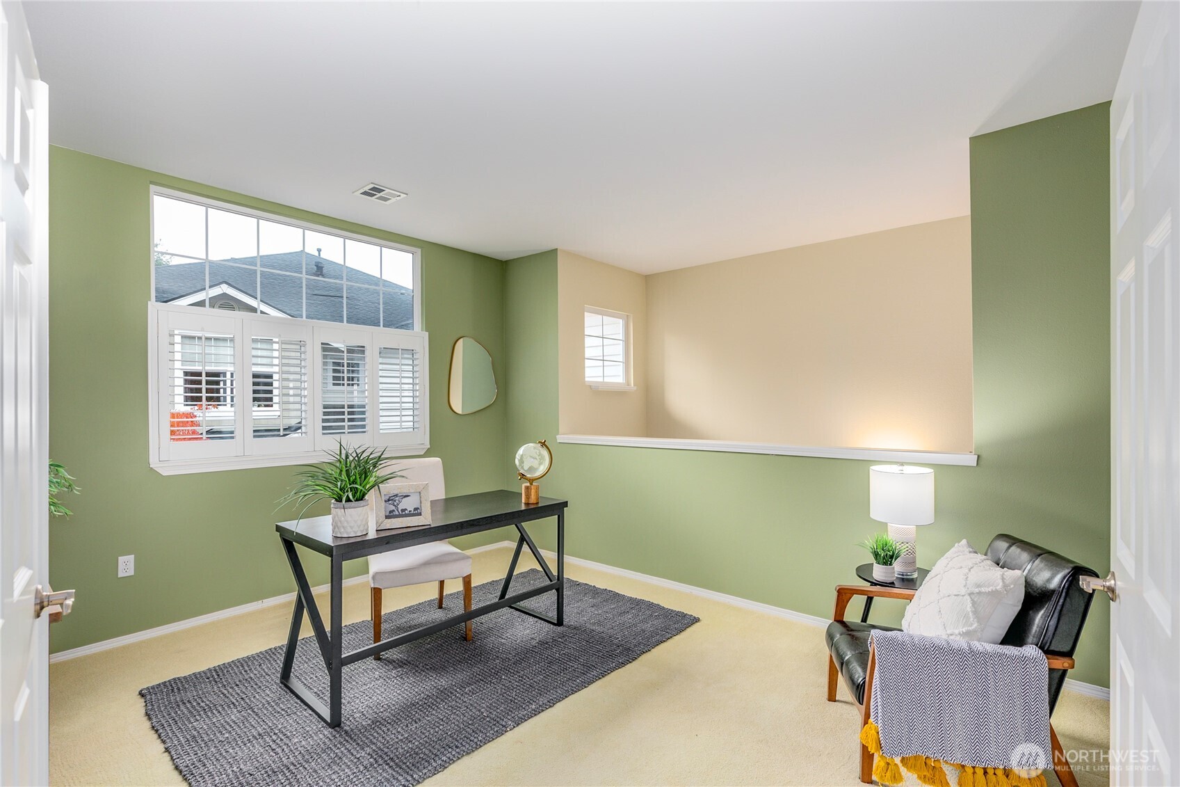 5500 Harbour Pointe Boulevard, Unit B202 Mukilteo, WA 98275 - Photo 5 of 30 a living room with furniture and a window