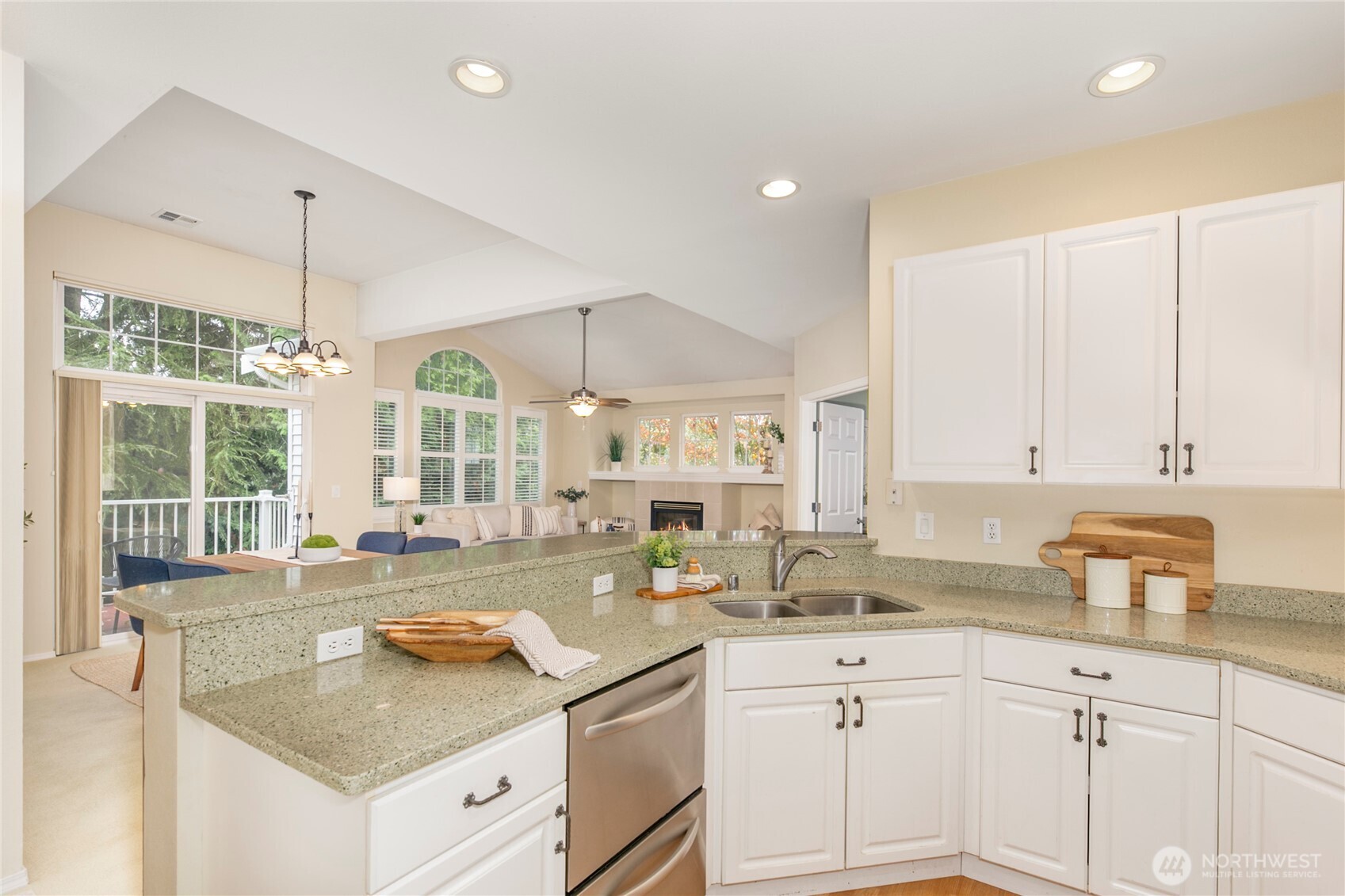 5500 Harbour Pointe Boulevard, Unit B202 Mukilteo, WA 98275 - Photo 9 of 30 a kitchen with a sink stove and cabinets