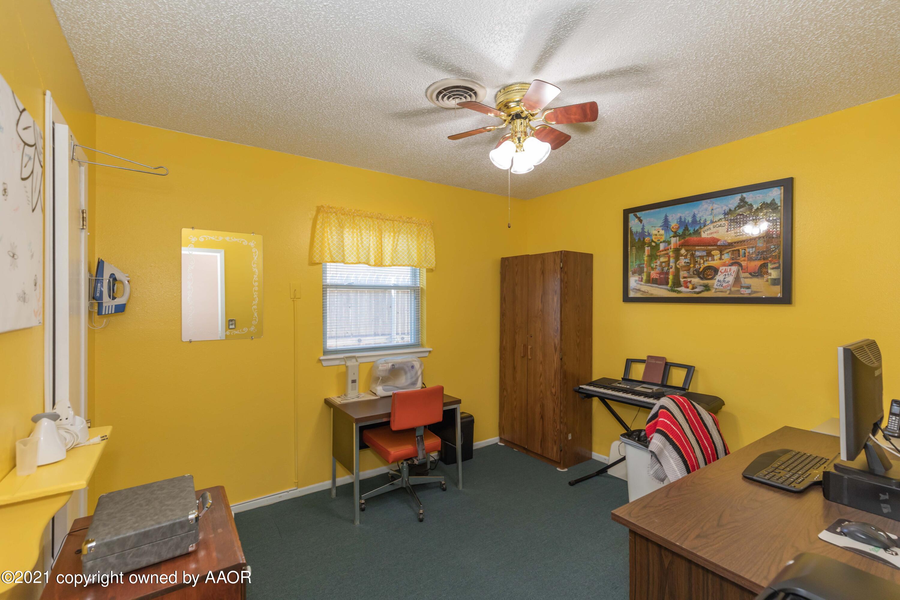 5104 McCarty Boulevard Amarillo, TX 79110 - Photo 24 of 35 a view of a workspace with furniture and gym equipment