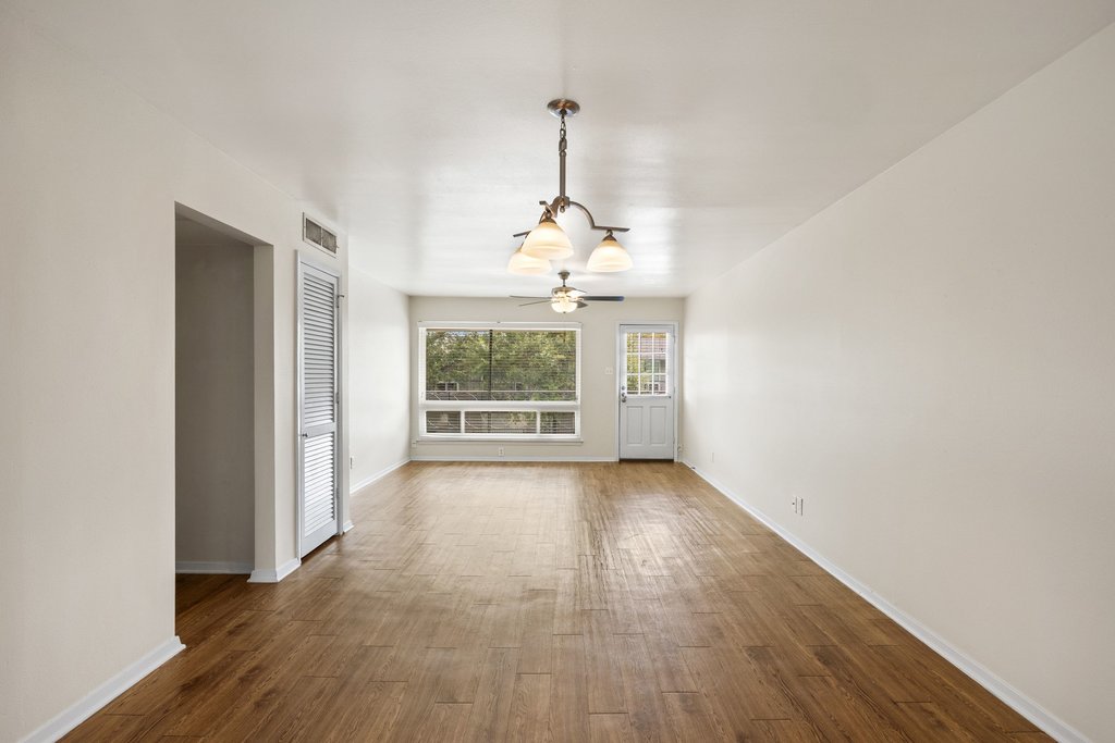 1210 Windsor Road, Unit 209 Austin, TX 78703 - Photo 6 of 38 The charming, established neighborhood offers a serene setting with mature greenery right outside our windows.
