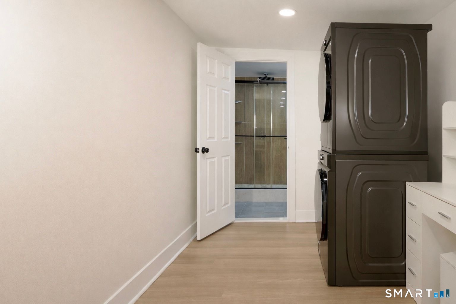 233 Glenbrook Road Stamford, CT 06906 - Photo 16 of 20 a view of hallway with washer and dryer