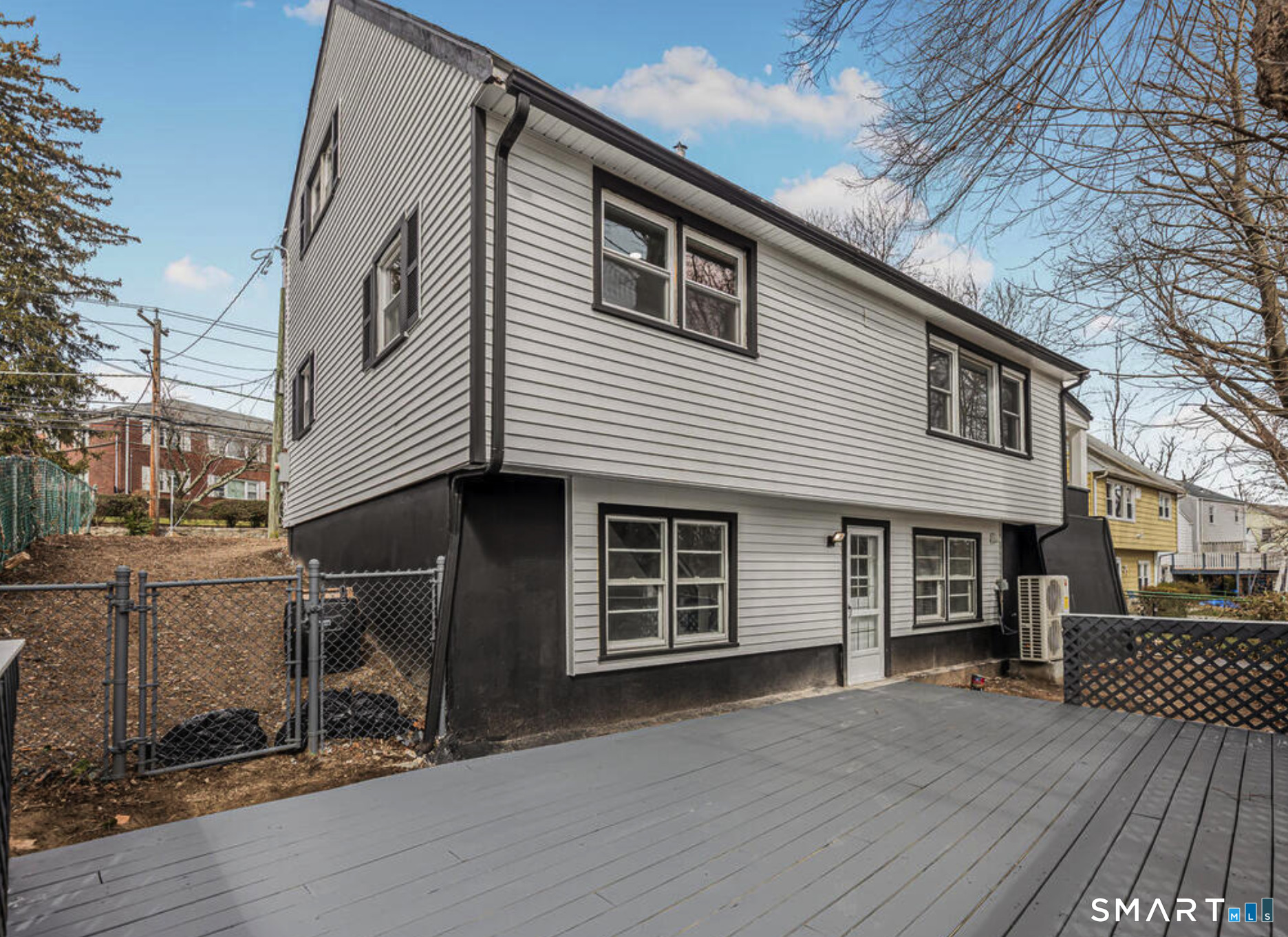 233 Glenbrook Road Stamford, CT 06906 - Photo 19 of 20 a front view of a house with a garage