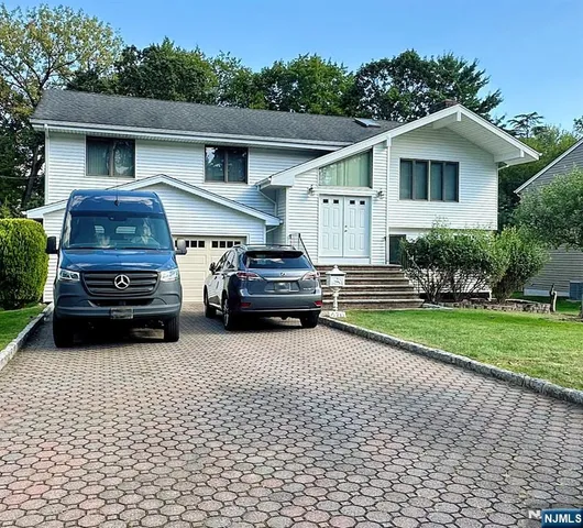 a car parked in front of a house