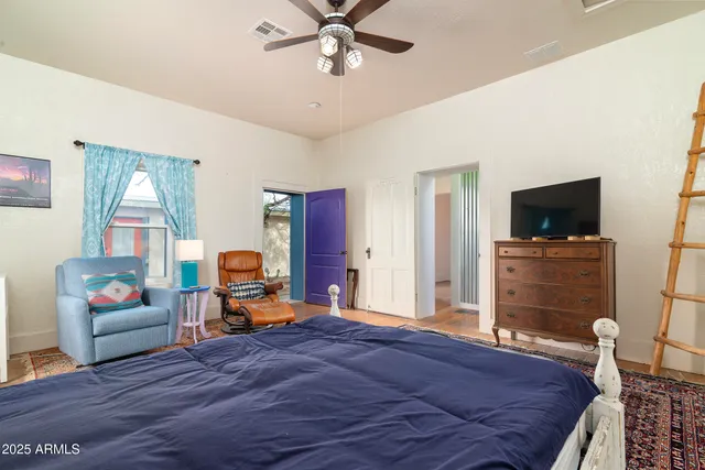 an empty room with a empty space and windows