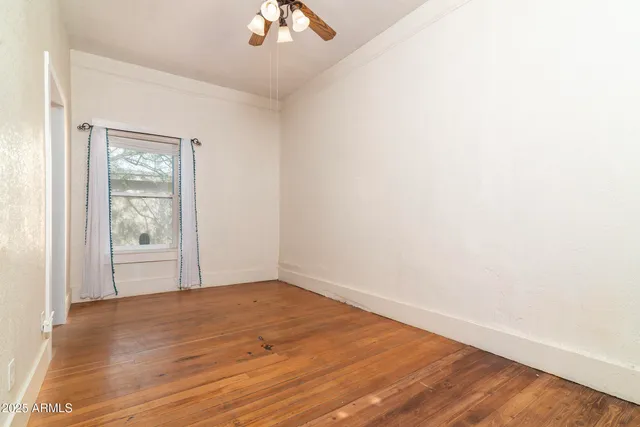 a bathroom with a sink vanity and a mirror
