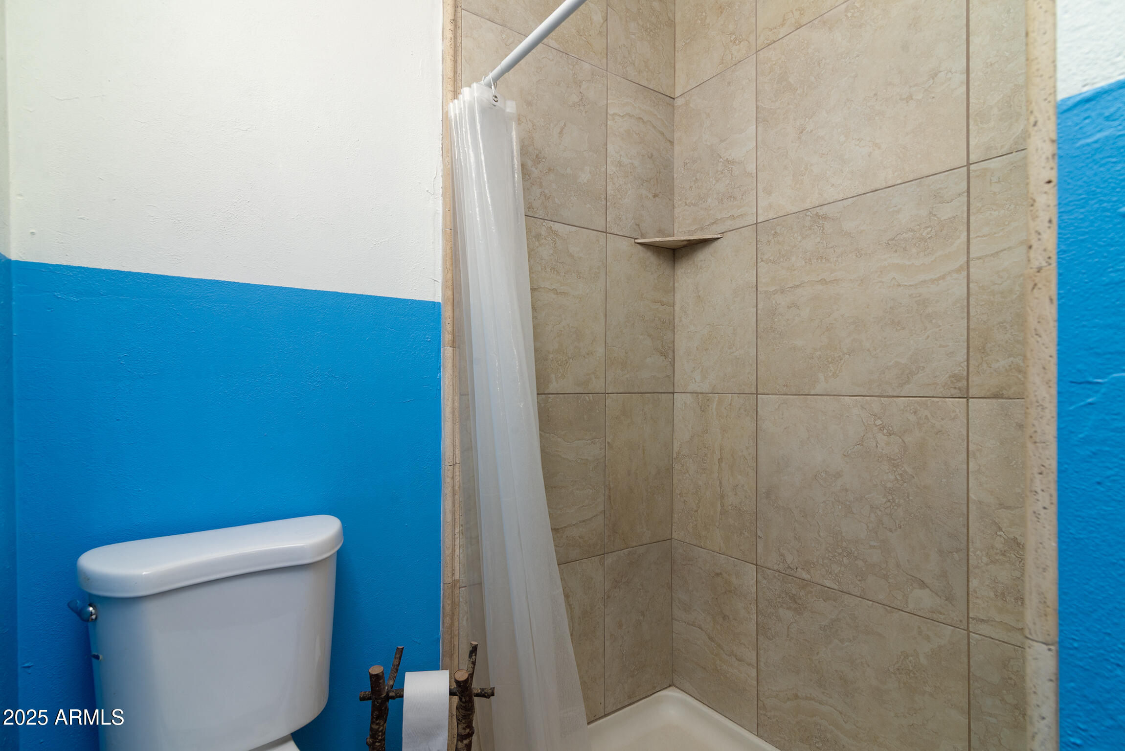 321 Bailey Street Florence, AZ 85132 - Photo 21 of 67 a bathroom with a toilet and a shower