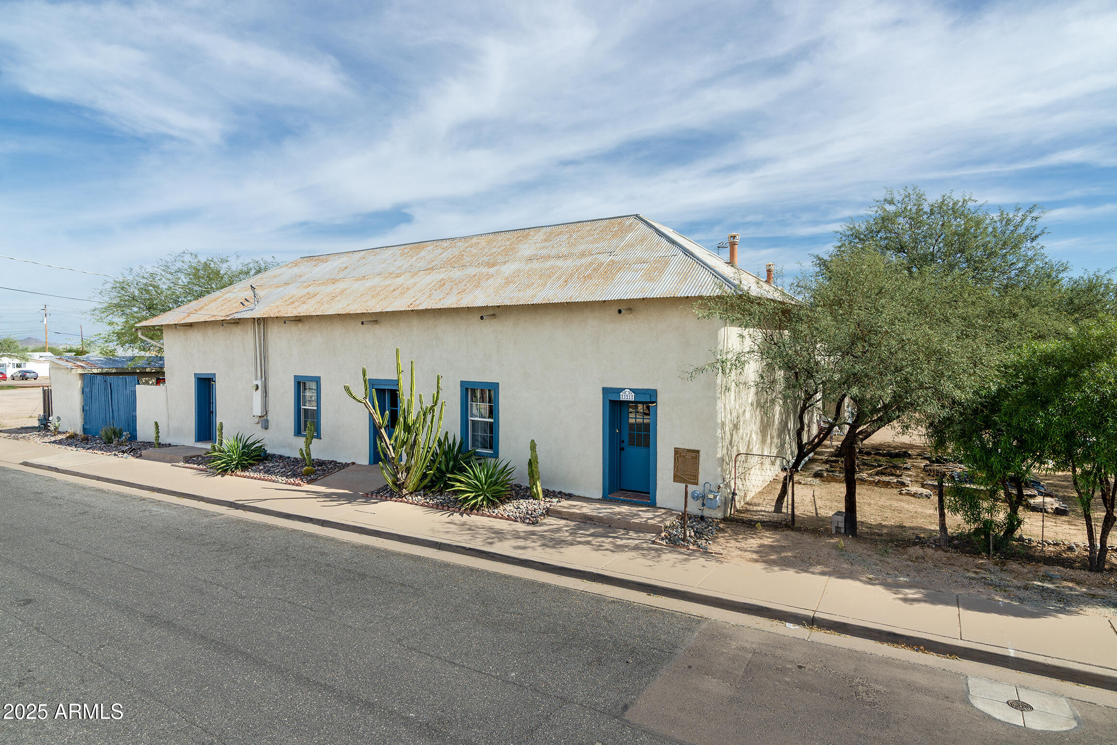 321 Bailey Street Florence, AZ 85132 - Photo 2 of 67 front view of a house with a patio
