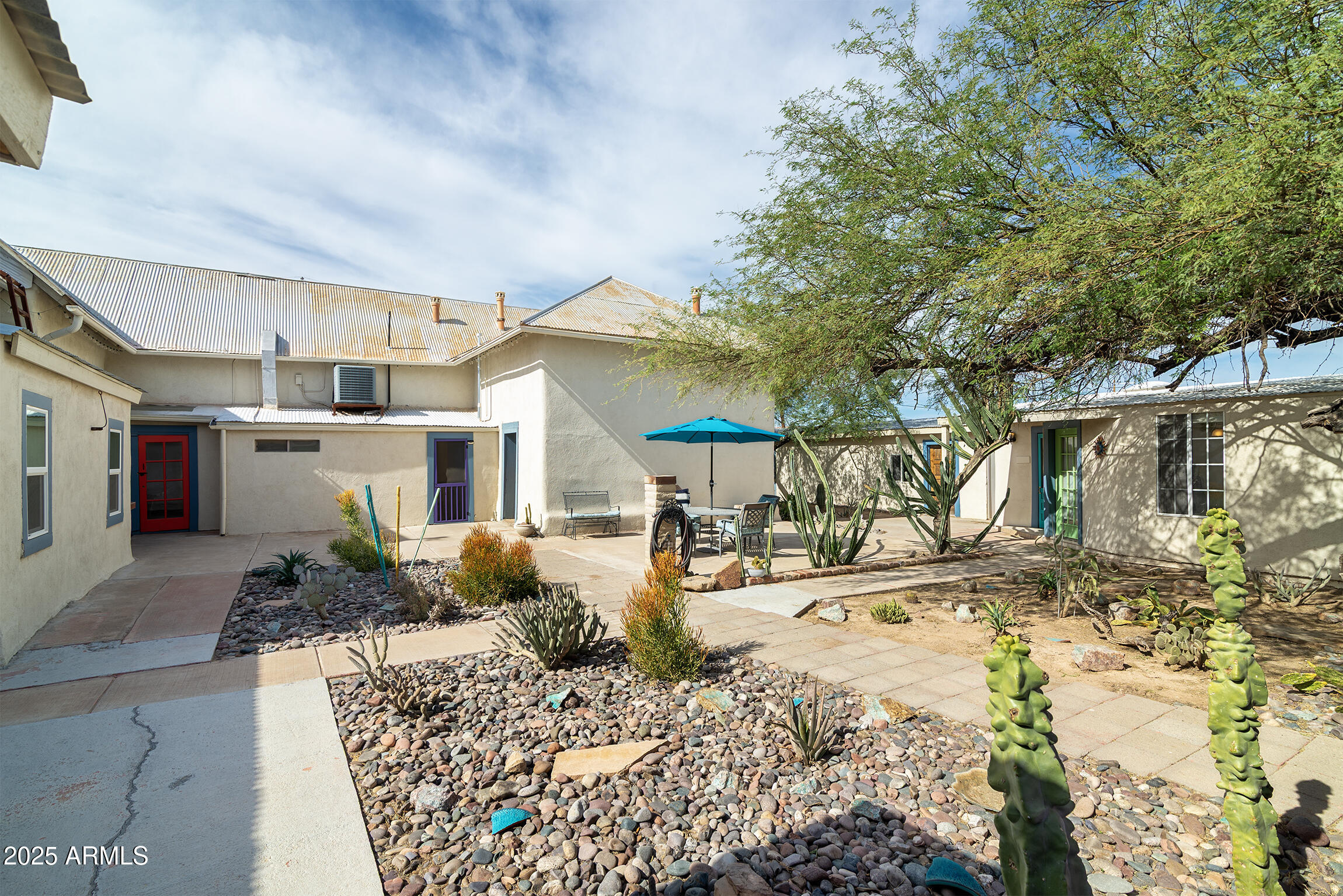 321 Bailey Street Florence, AZ 85132 - Photo 34 of 67 a view of a house with a patio