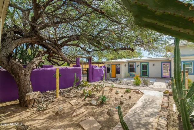 a backyard of a house with seating space