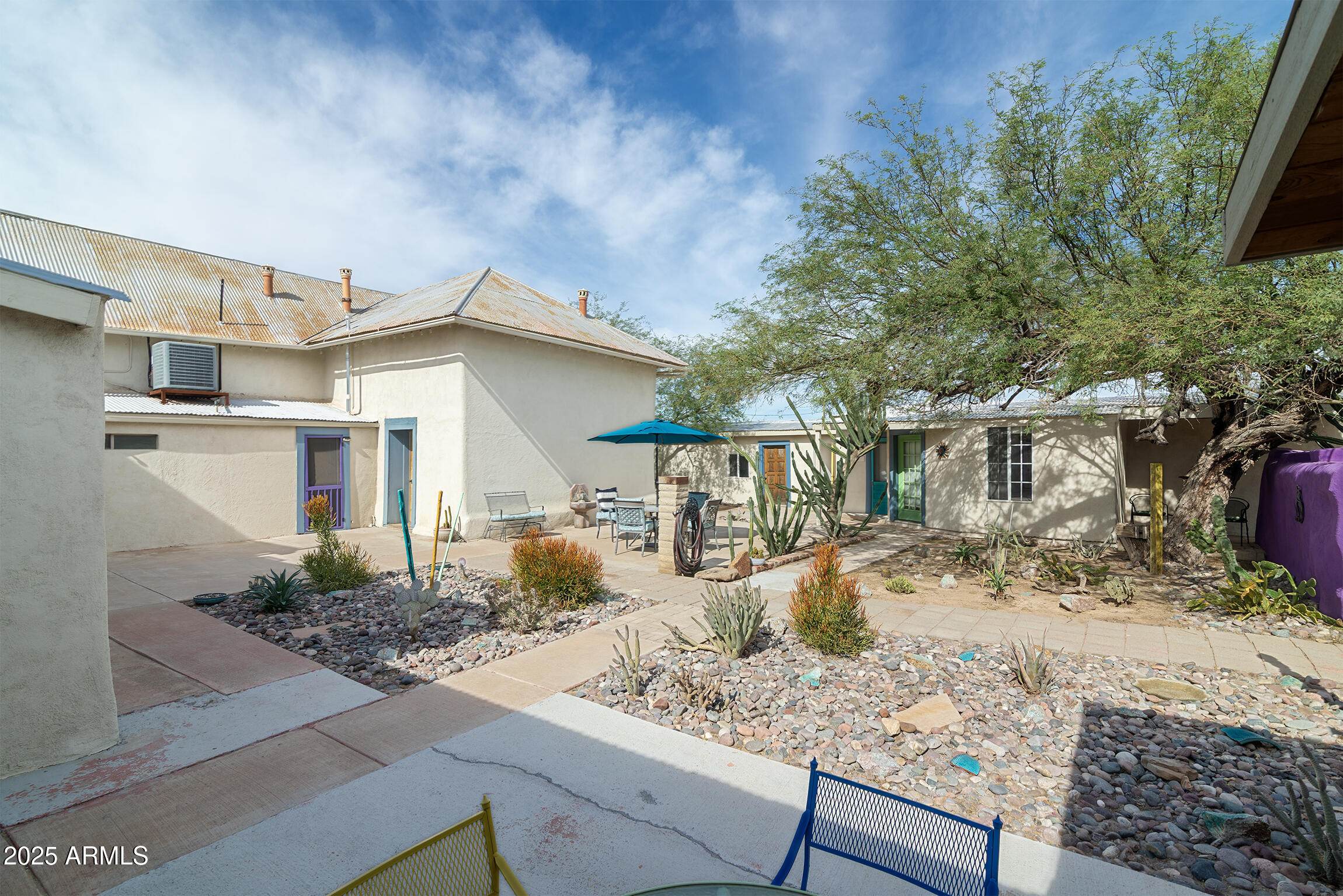 321 Bailey Street Florence, AZ 85132 - Photo 41 of 67 a white house that has tree in front of it