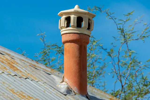 a picture of a bathroom with a shower