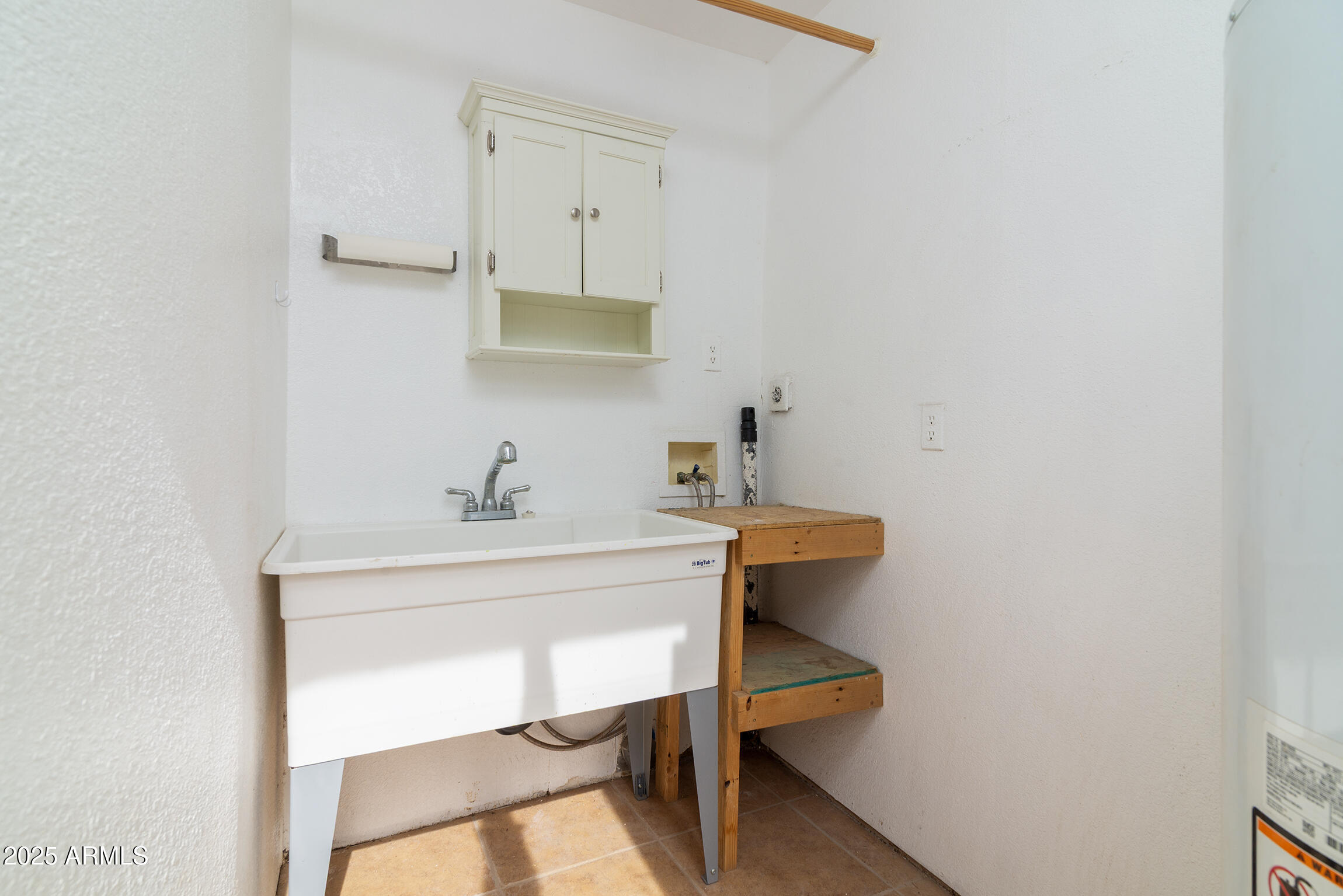 321 Bailey Street Florence, AZ 85132 - Photo 56 of 67 a view of a room that has a table and chair in it