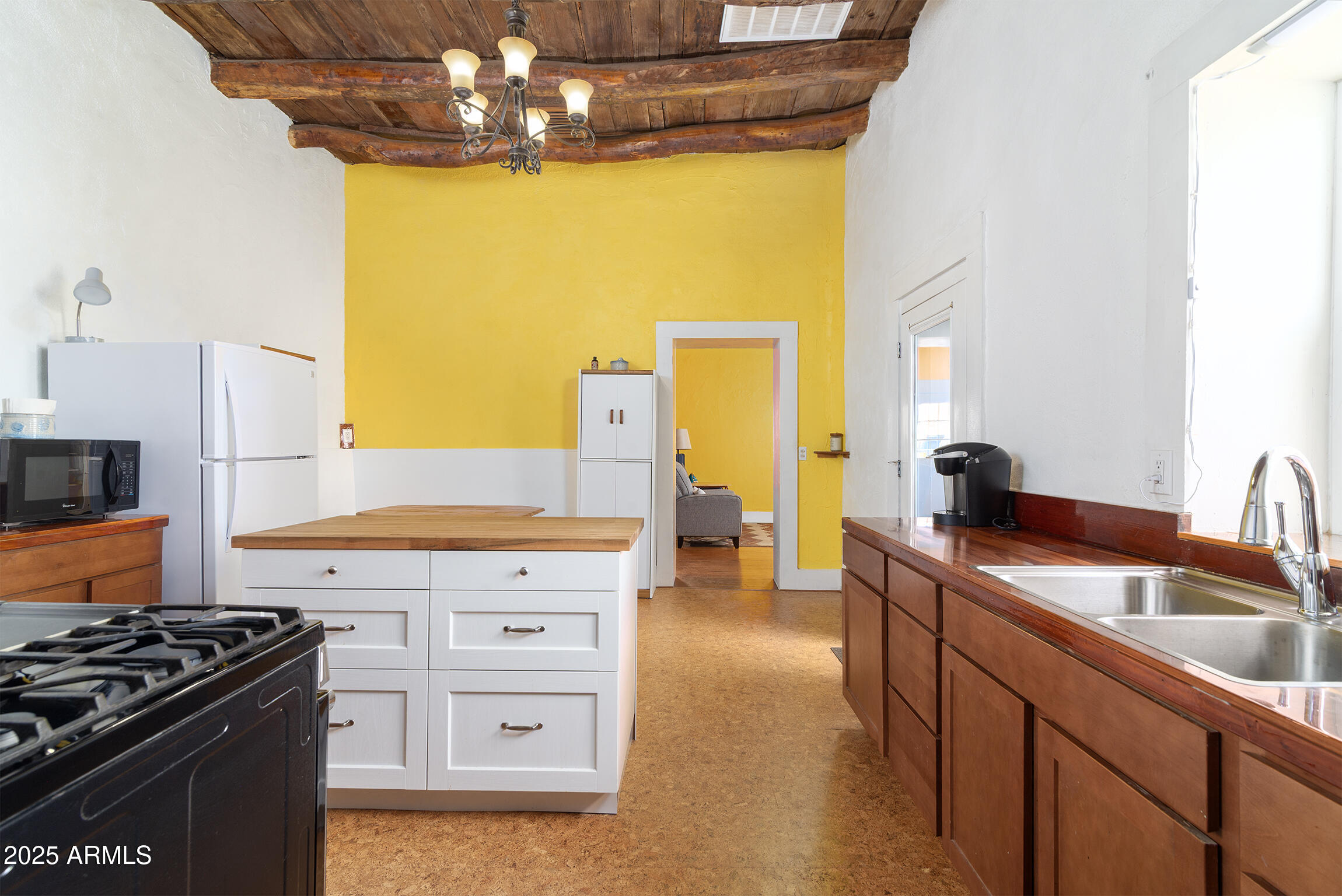321 Bailey Street Florence, AZ 85132 - Photo 8 of 67 a kitchen with a stove and a sink