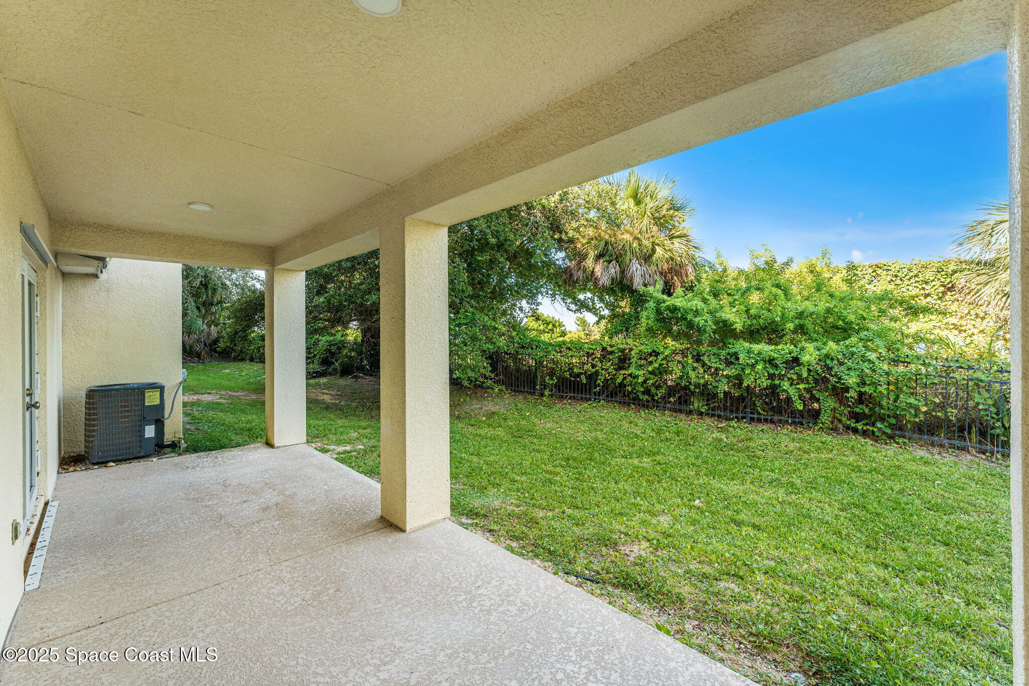 890 Vignoles Avenue Northeast, Unit 6 Palm Bay, FL 32905 - Photo 42 of 49 a view of a garden with an outdoor seating