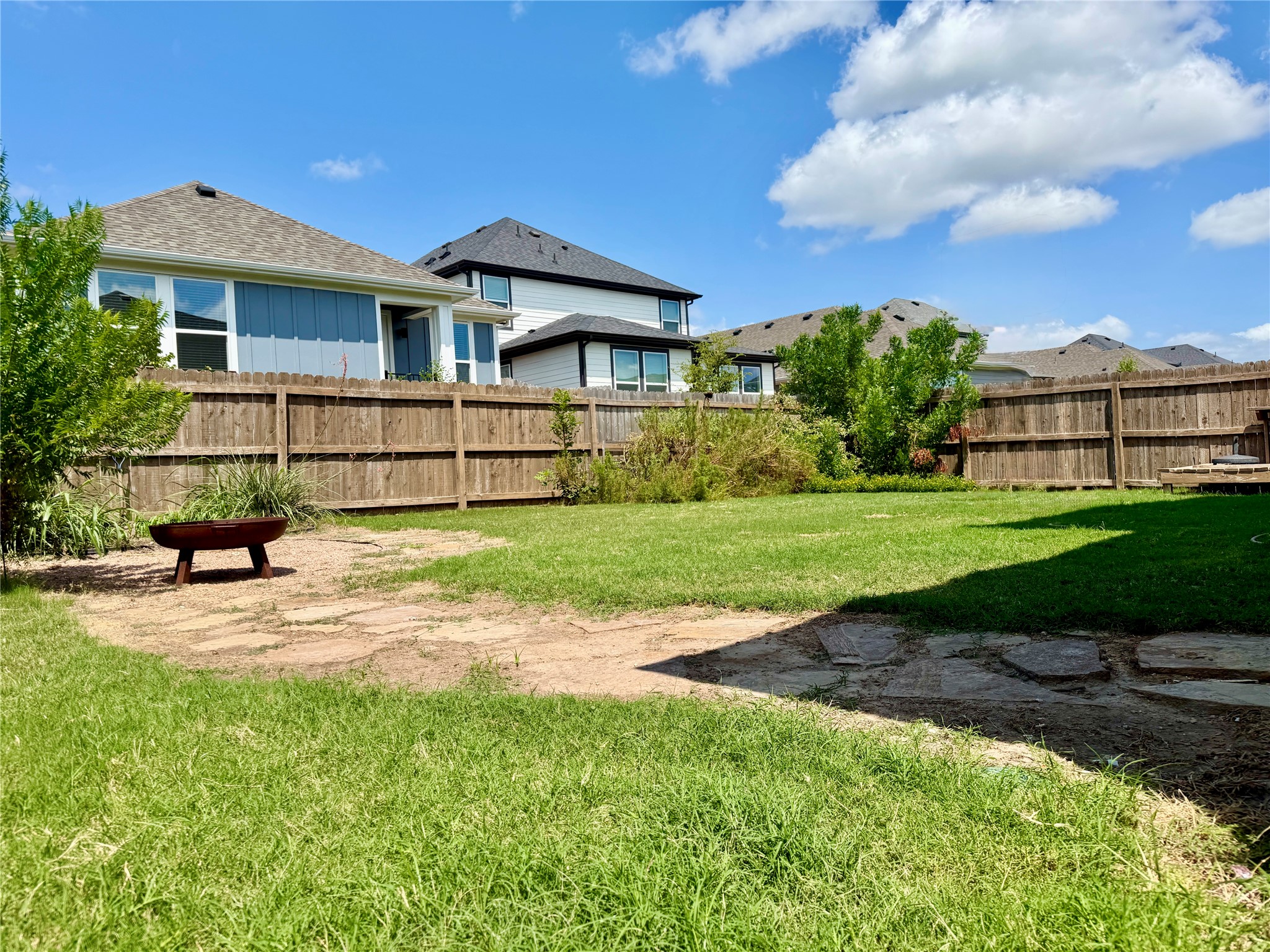 2137 Ringstaff Road Leander, TX 78641 - Photo 35 of 40 A spacious backyard offers plenty of room for a playground or trampoline.