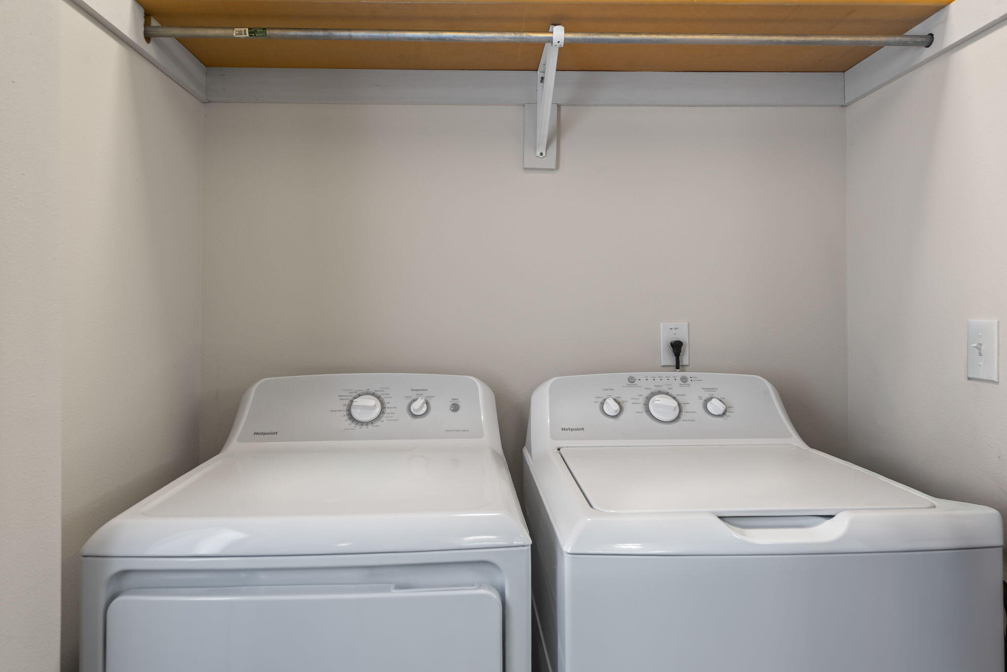 8528 Laredo Street Navarre, FL 32566 - Photo 13 of 16 a utility room with dryer and washer