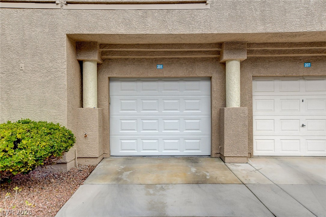 2052 Quarry Ridge Street, Unit 201 Las Vegas, NV 89117 - Photo 24 of 25 Secure parking solutions with attached garage access.