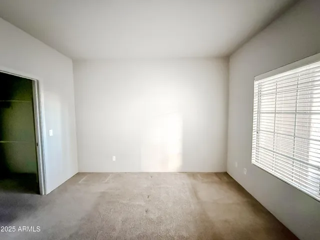 an empty room with a window