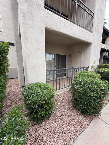 a view of a house with a garden