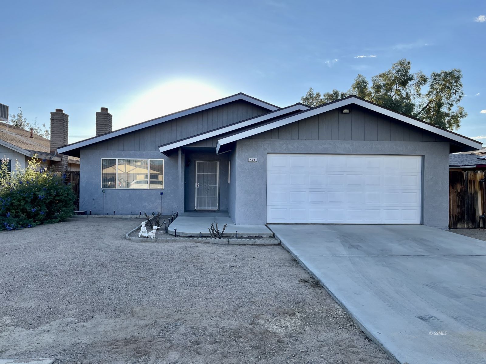 429 South Fountain Street Ridgecrest, CA 93555 - Photo 3 of 33 a view of an house with backyard space and garden