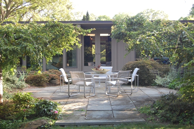 61 Hopewell Woods Road Redding, CT 06896 - Photo 11 of 22 a view of a house with backyard and sitting area