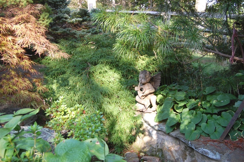 61 Hopewell Woods Road Redding, CT 06896 - Photo 17 of 22 a view of a garden