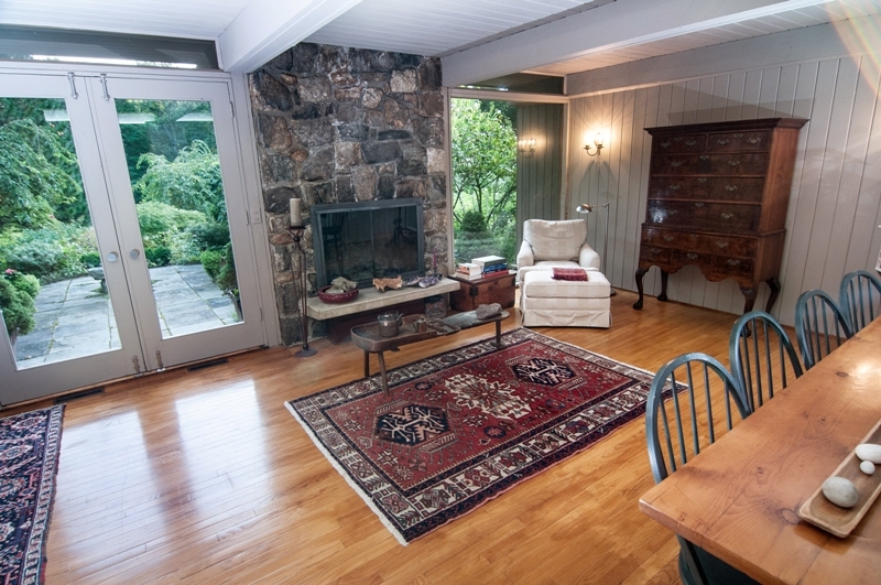 61 Hopewell Woods Road Redding, CT 06896 - Photo 3 of 22 a living room with furniture and a fireplace