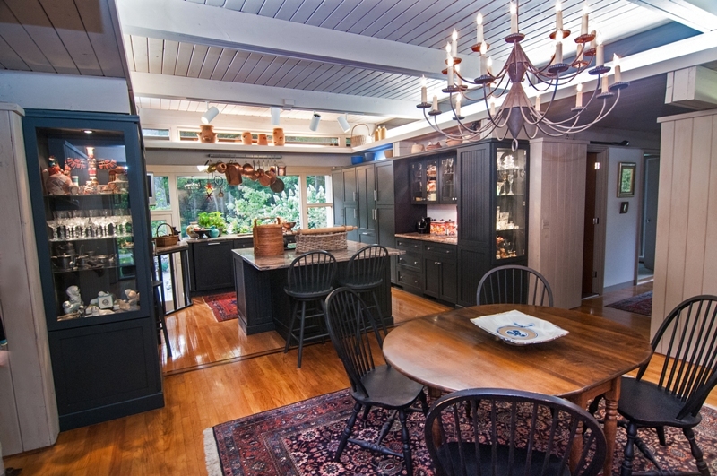 61 Hopewell Woods Road Redding, CT 06896 - Photo 6 of 22 a dining room with furniture a chandelier and window