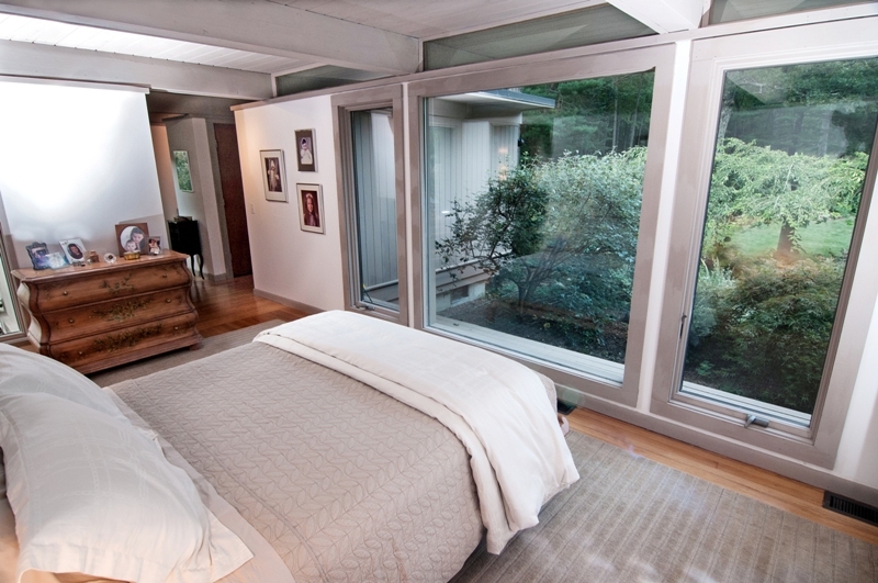 61 Hopewell Woods Road Redding, CT 06896 - Photo 7 of 22 a bedroom with a bed and a large window