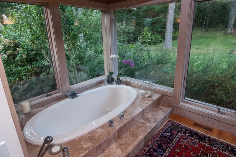 61 Hopewell Woods Road Redding, CT 06896 - Photo 9 of 22 a view of a bathtub in a yard