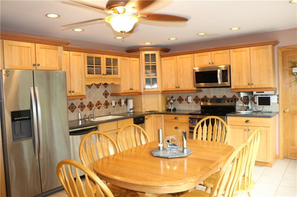 326 Patten Pond Road Surry, ME 04684 - Photo 7 of 35 Attractive kitchen Corian counters.