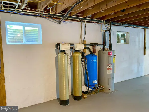 a view of a closet area with empty racks