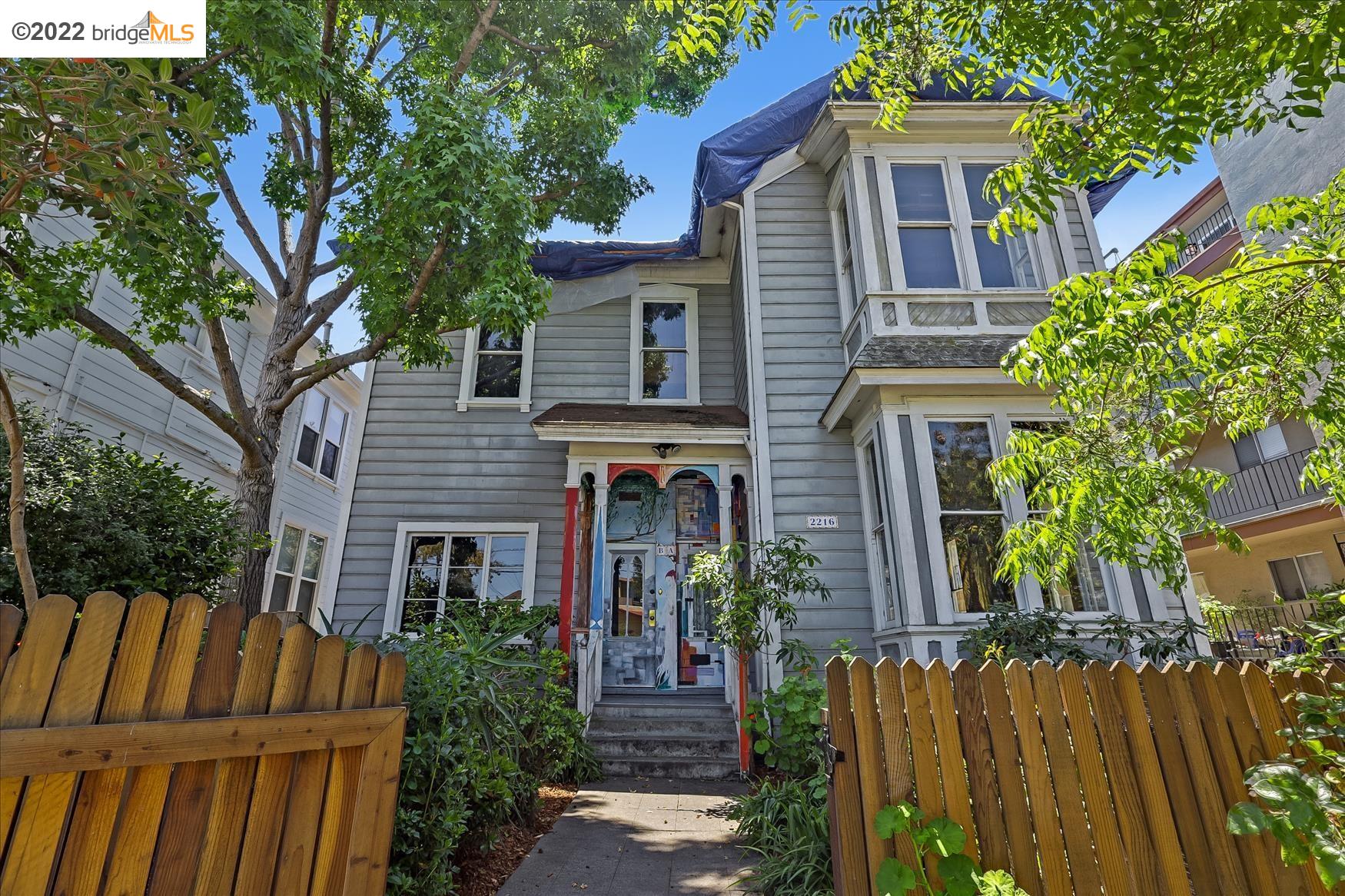 2216 Blake Street, Unit B Berkeley, CA 94704 - Photo 1 of 1 a front view of a house with a garden