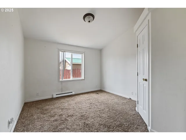 a view of an empty room with window