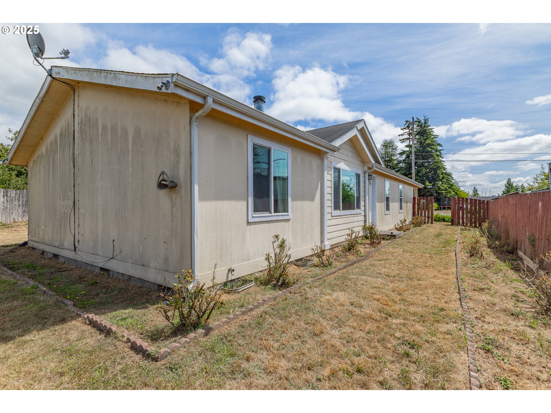 1829 East Willow Street Myrtle Point, OR 97458 - Photo 34 of 37 a house view with a backyard space