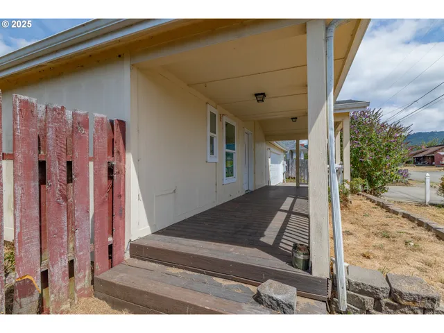 an aerial view of a house with a garden