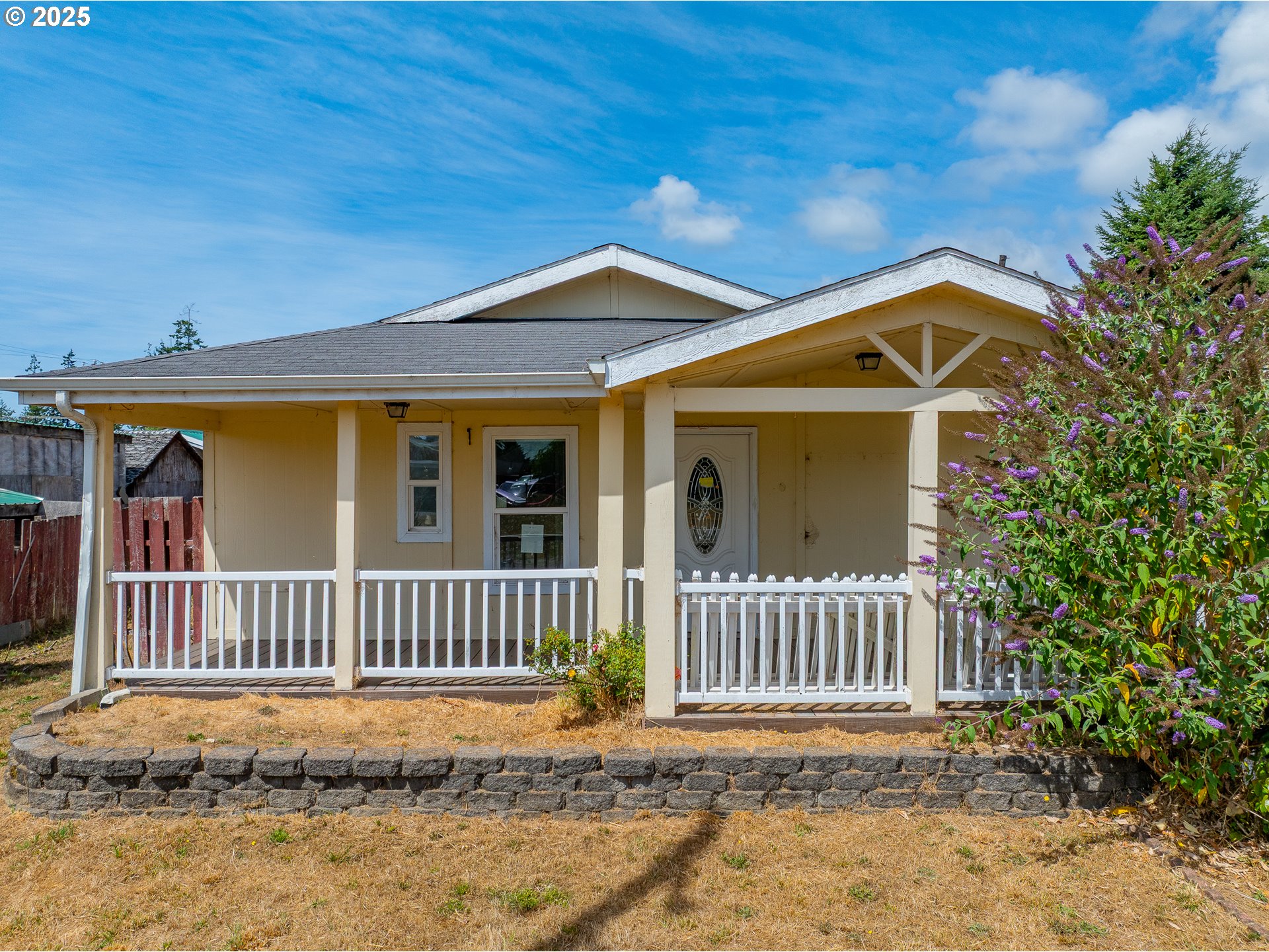 1829 East Willow Street Myrtle Point, OR 97458 - Photo 5 of 37 a front view of a house with a porch