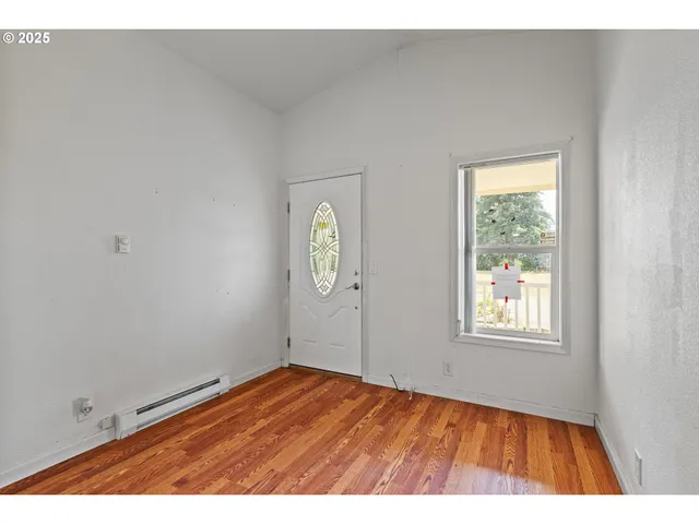 an empty room with window