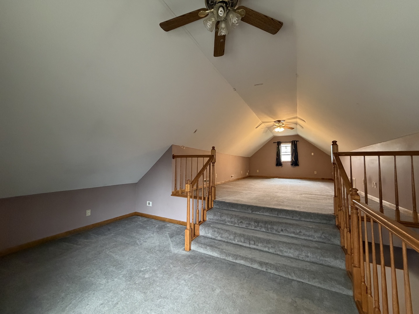 616 East Main Street Amboy, IL 61310 - Photo 16 of 24 a bedroom with a bed and a chandelier
