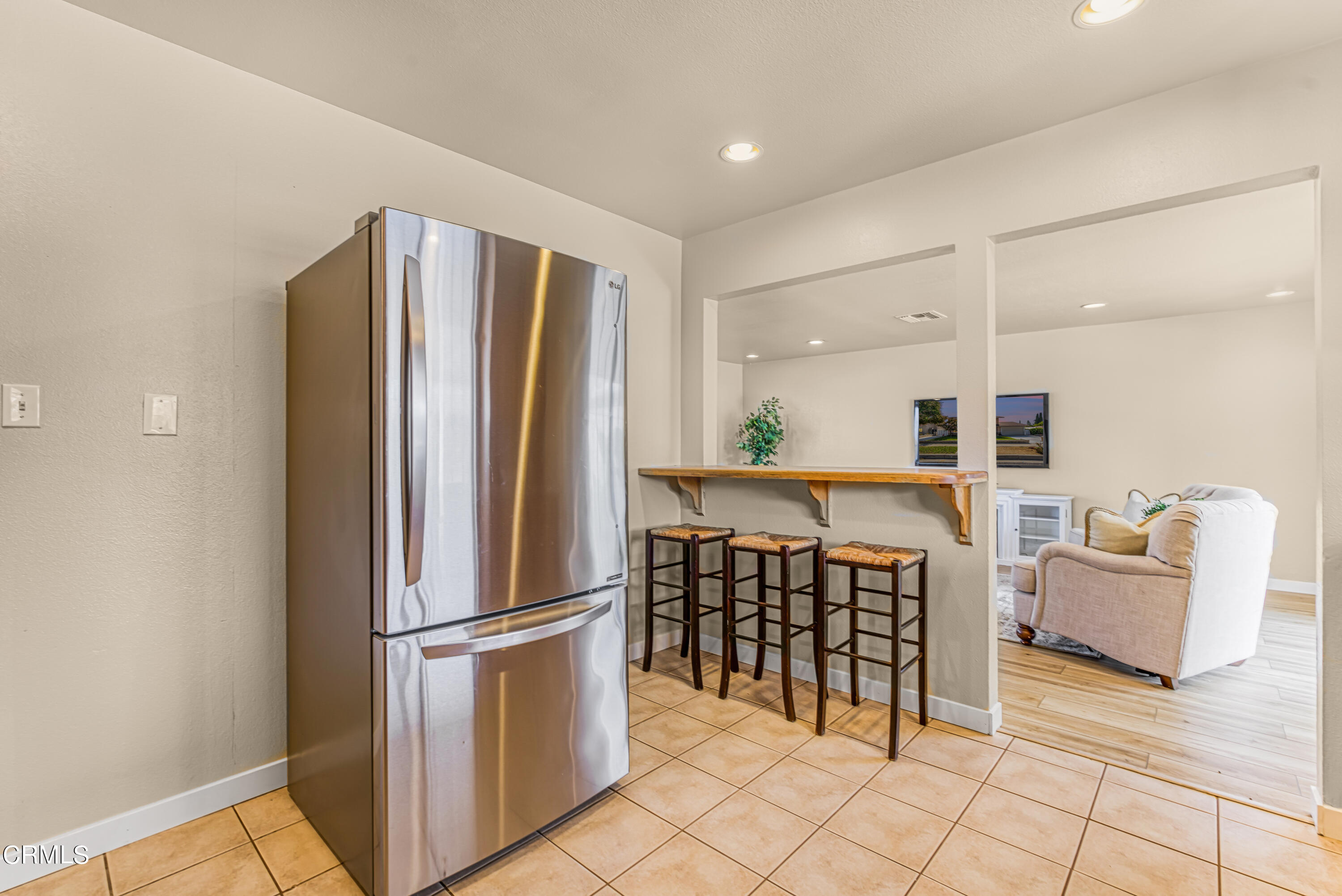 2810 Fitzgerald Road Simi Valley, CA 93065 - Photo 13 of 38 a kitchen with stainless steel appliances granite countertop a refrigerator and a sink