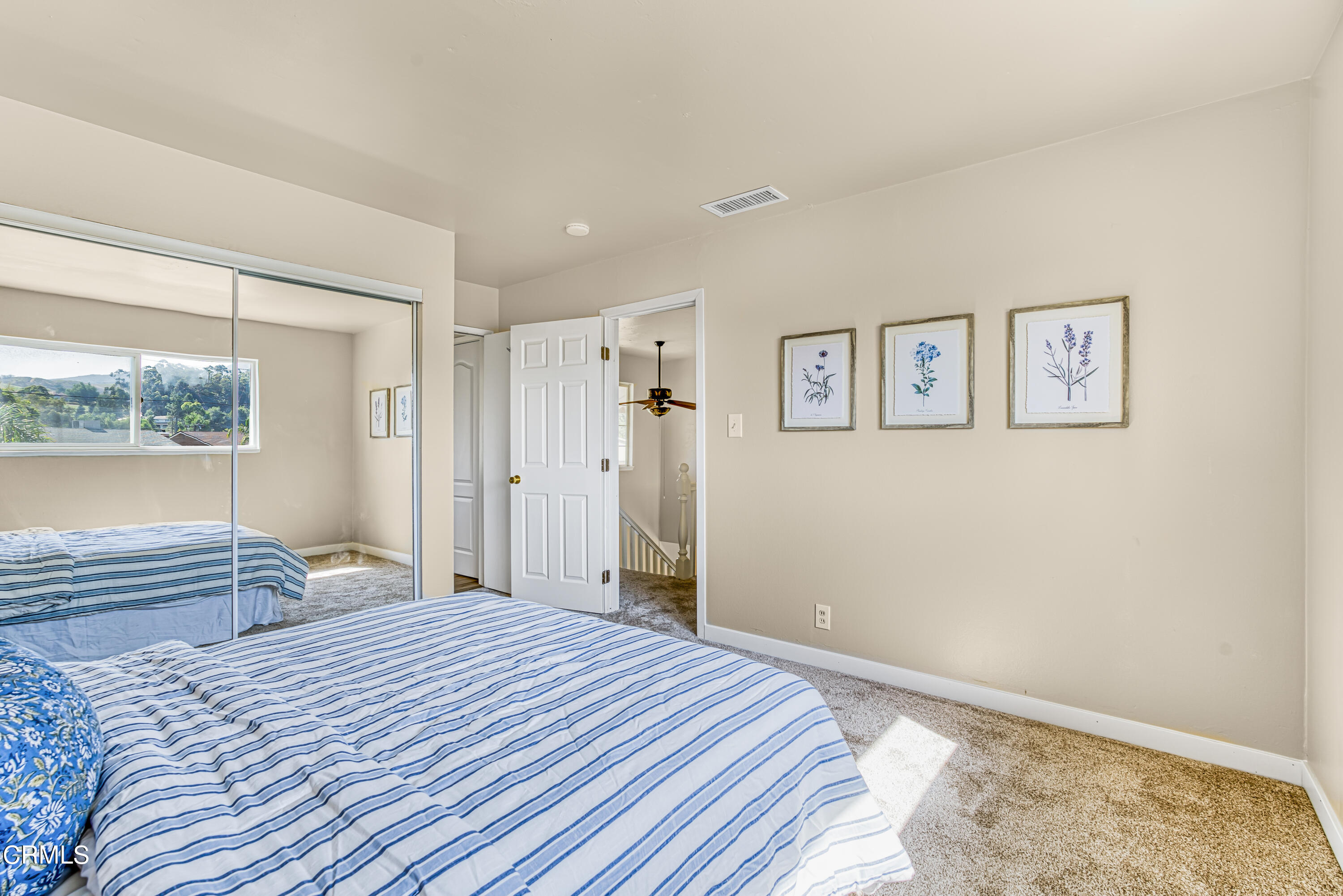 2810 Fitzgerald Road Simi Valley, CA 93065 - Photo 18 of 38 a bedroom with a bed and a window