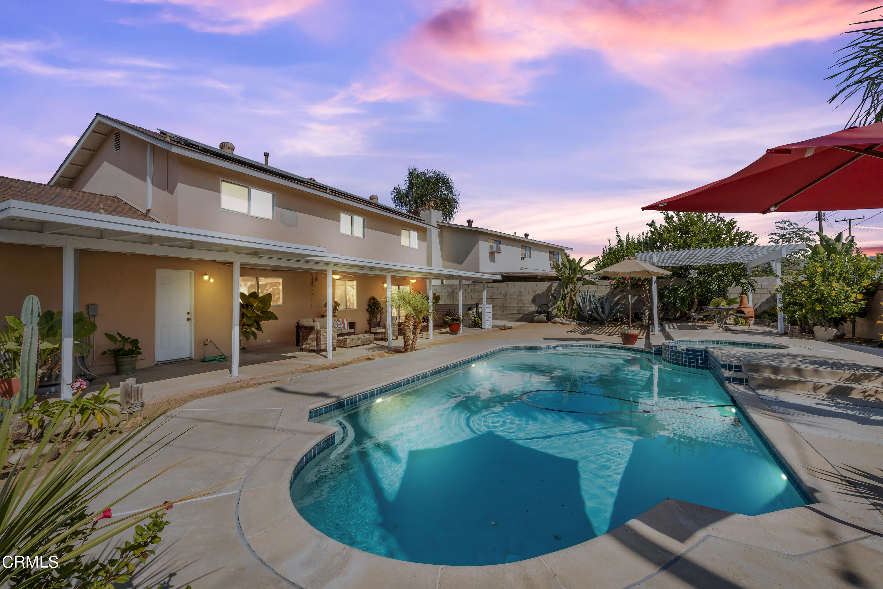 2810 Fitzgerald Road Simi Valley, CA 93065 - Photo 2 of 38 a view of a house with swimming pool and sitting area