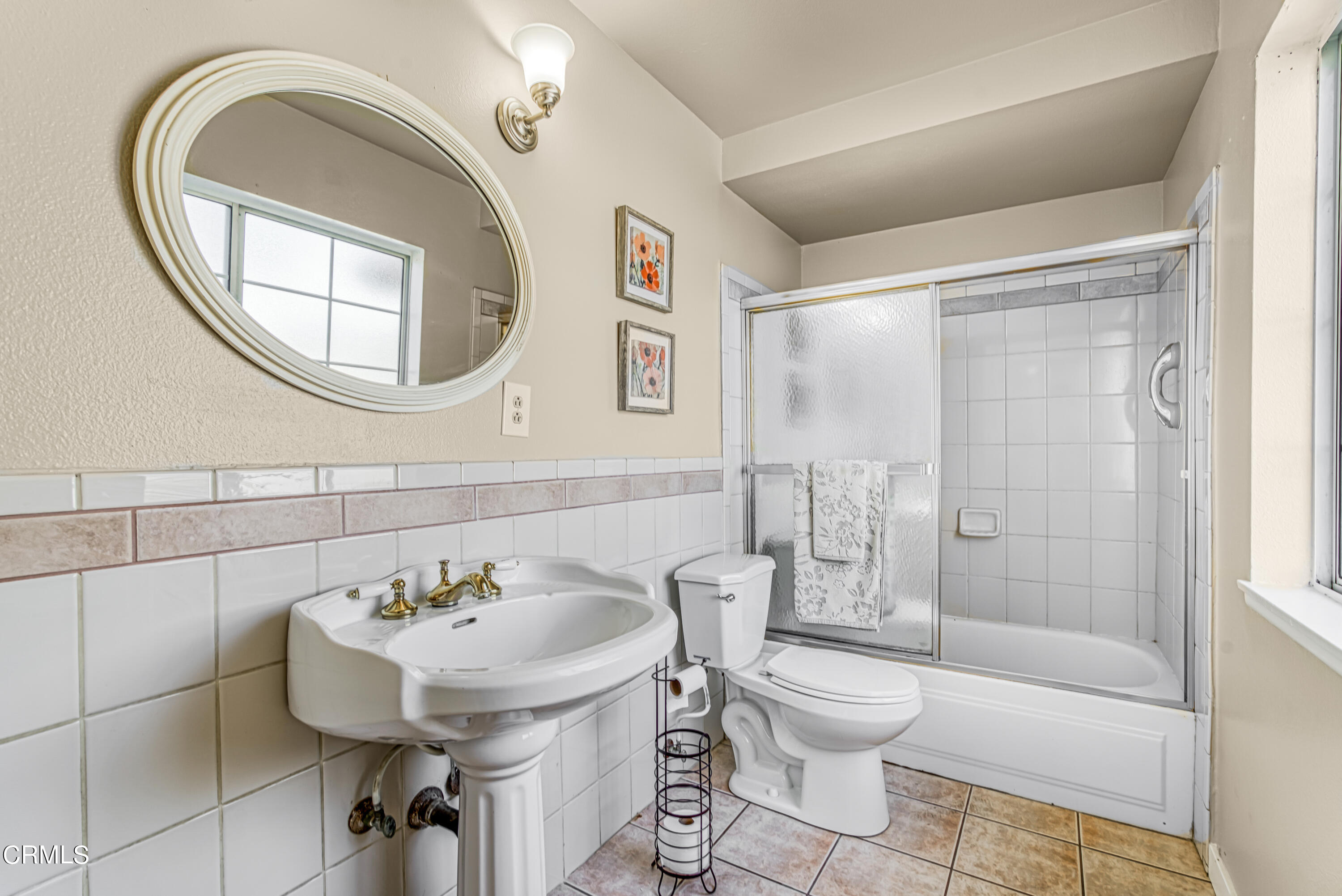 2810 Fitzgerald Road Simi Valley, CA 93065 - Photo 22 of 38 a bathroom with a toilet sink and mirror