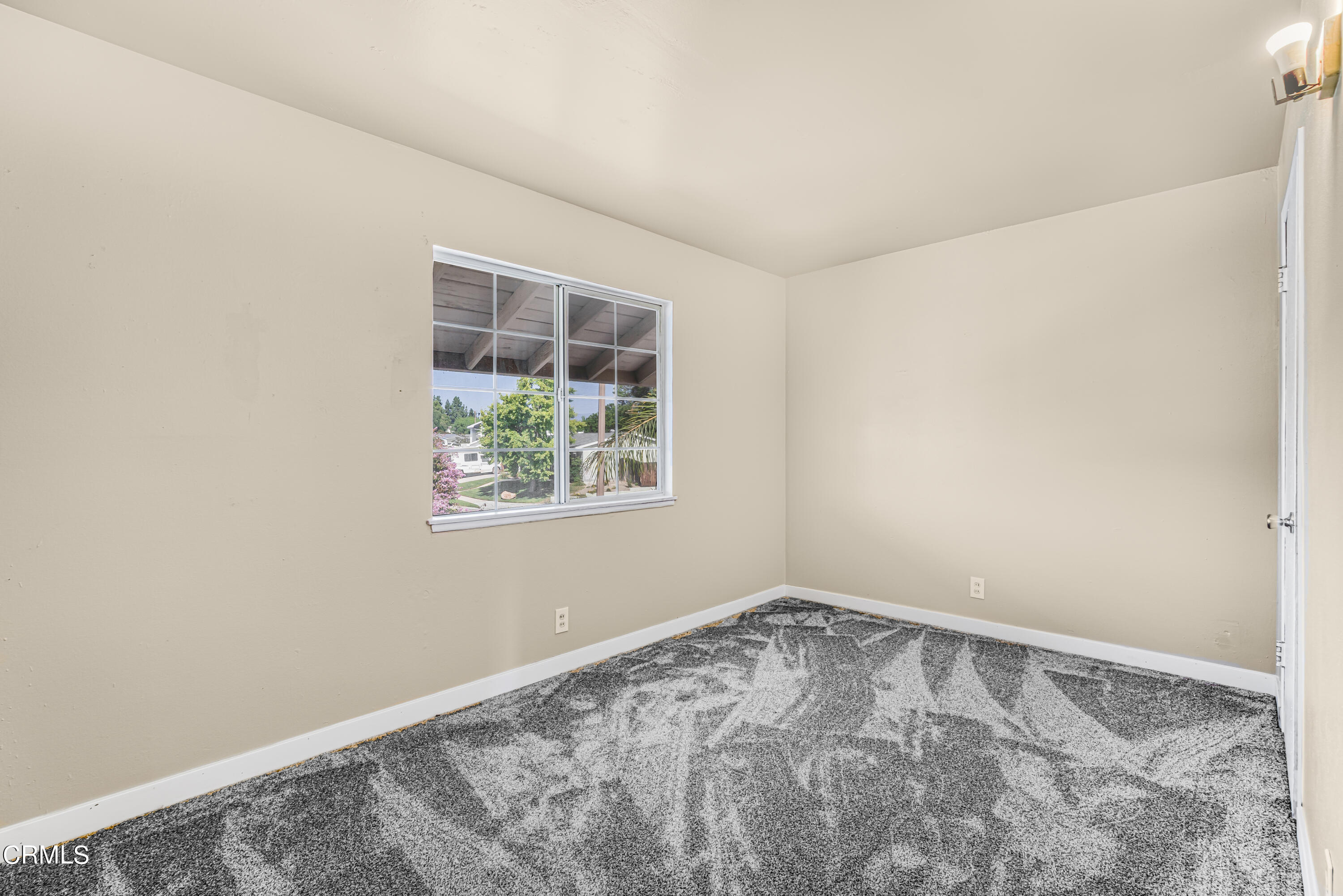 2810 Fitzgerald Road Simi Valley, CA 93065 - Photo 23 of 38 an empty room with a window