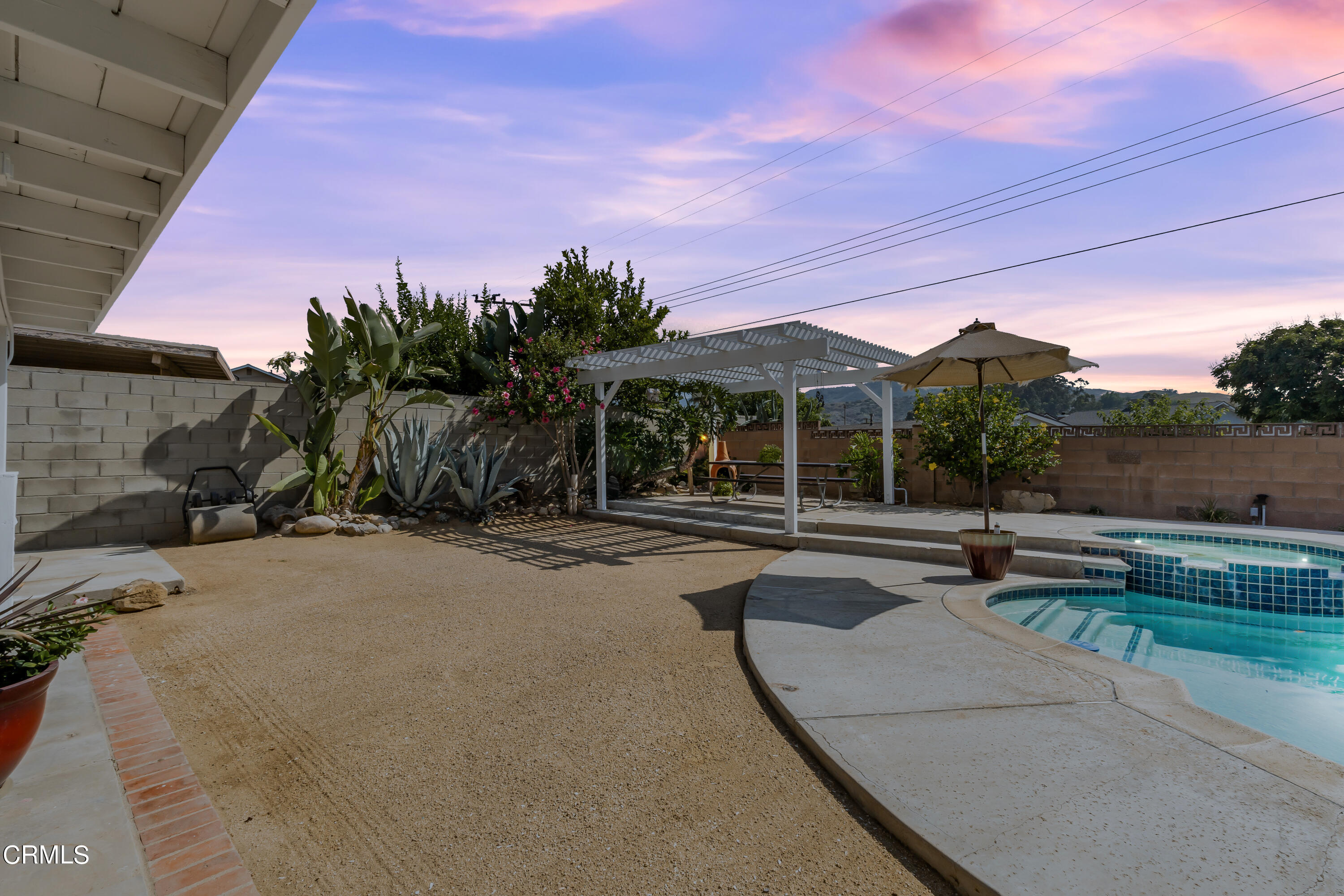2810 Fitzgerald Road Simi Valley, CA 93065 - Photo 30 of 38 a view of a house with patio and a yard