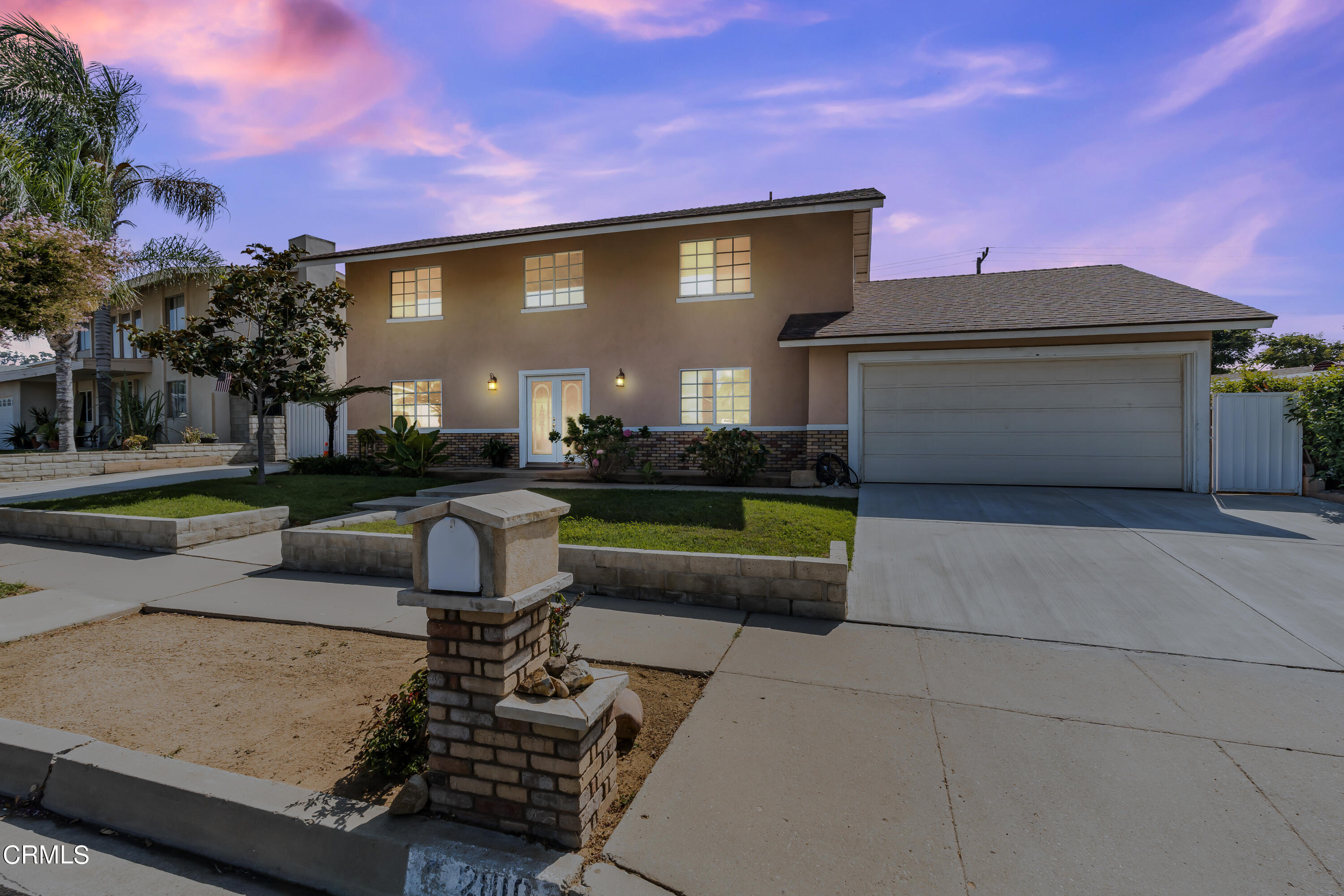 2810 Fitzgerald Road Simi Valley, CA 93065 - Photo 3 of 38 a front view of a house with a yard