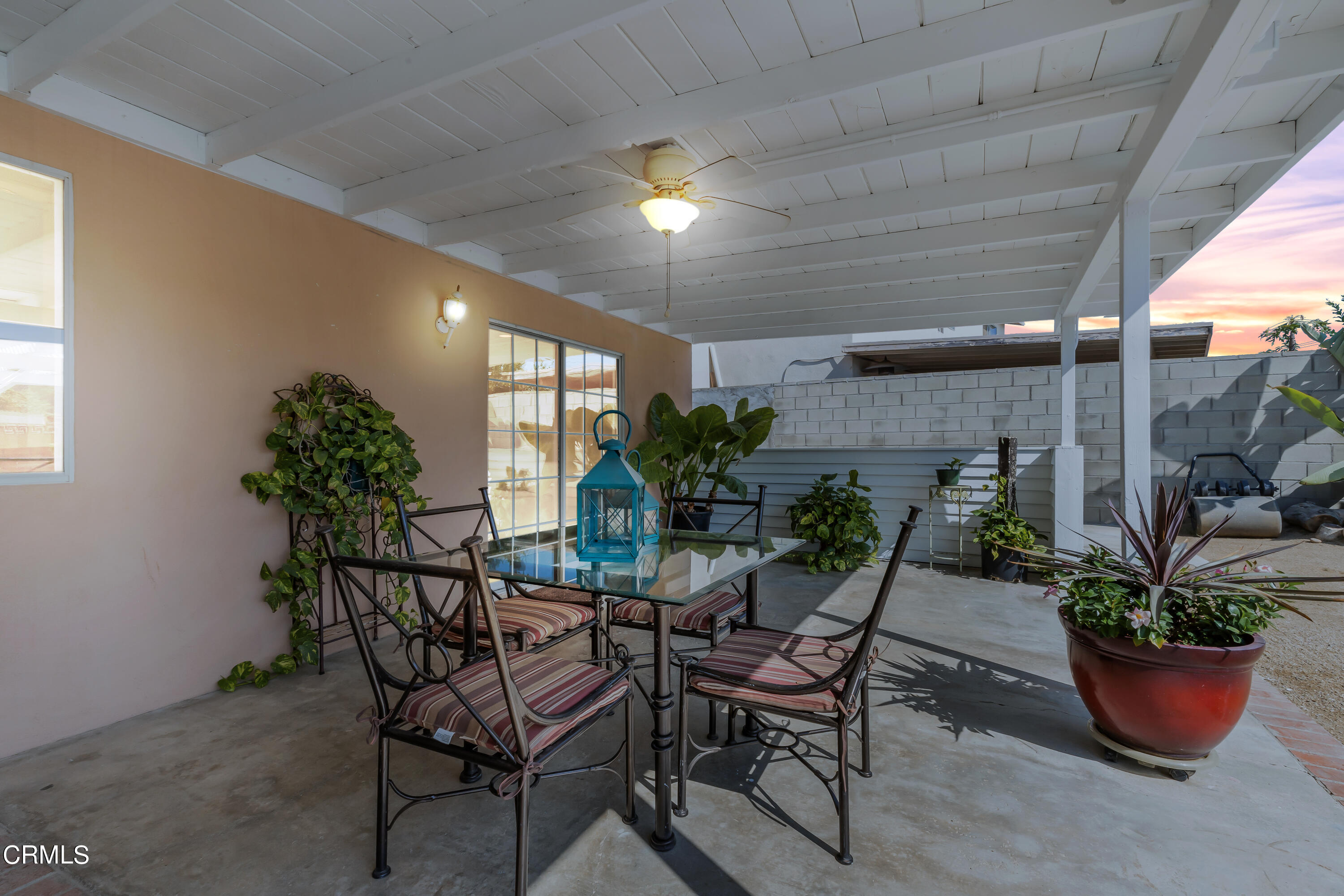 2810 Fitzgerald Road Simi Valley, CA 93065 - Photo 32 of 38 a view of a dining room with furniture and potted plants