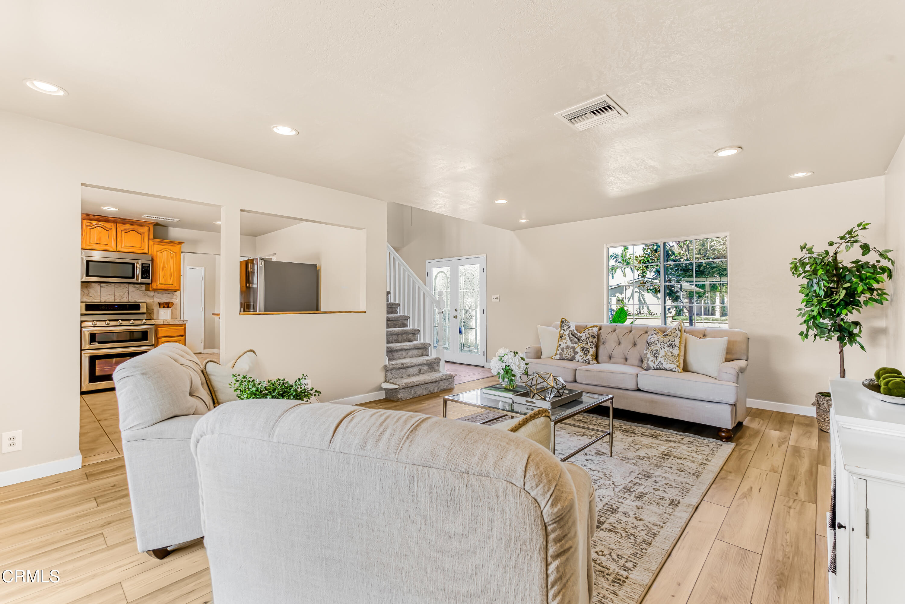 2810 Fitzgerald Road Simi Valley, CA 93065 - Photo 6 of 38 a living room with furniture and a large window