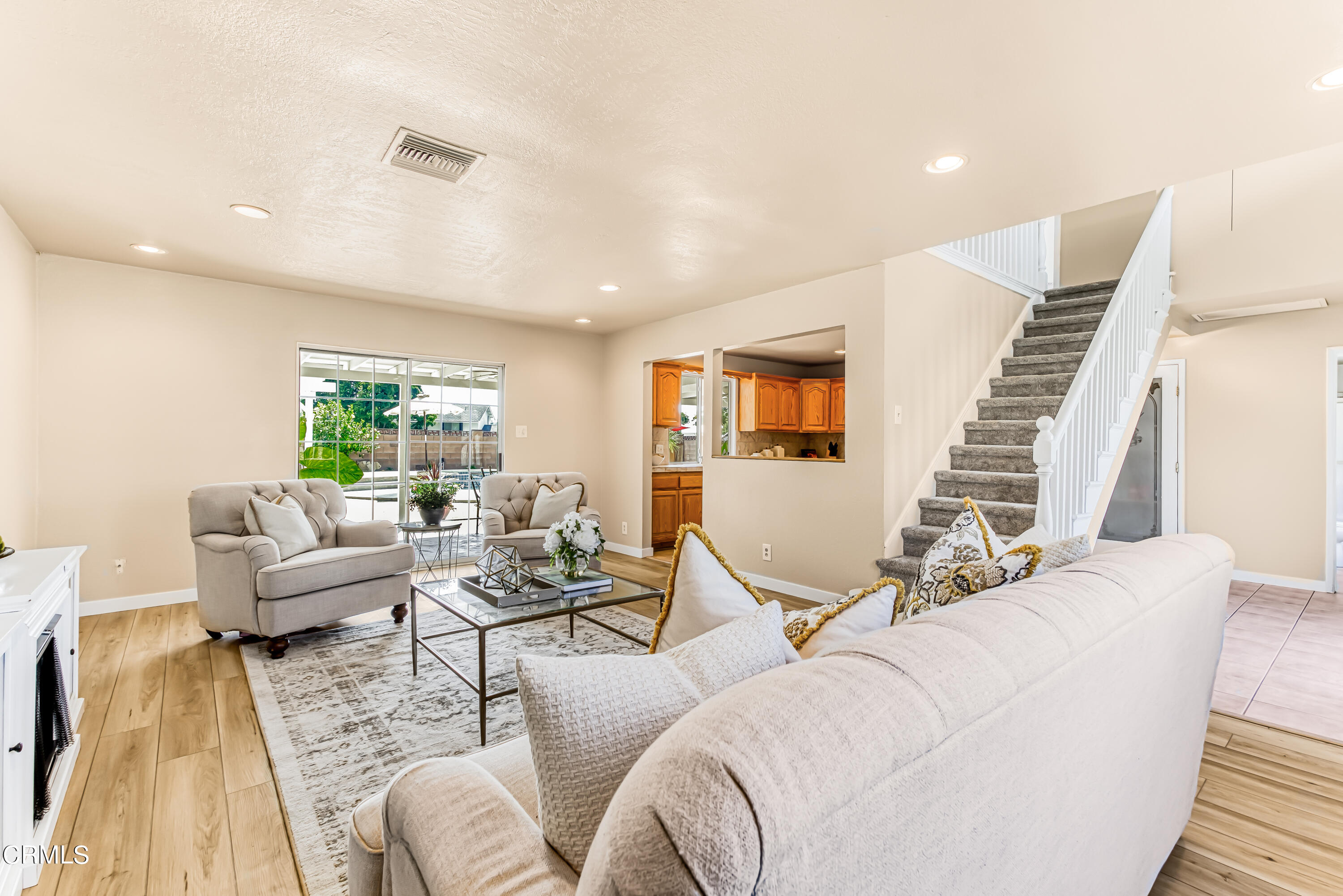 2810 Fitzgerald Road Simi Valley, CA 93065 - Photo 7 of 38 a living room with furniture and wooden floor